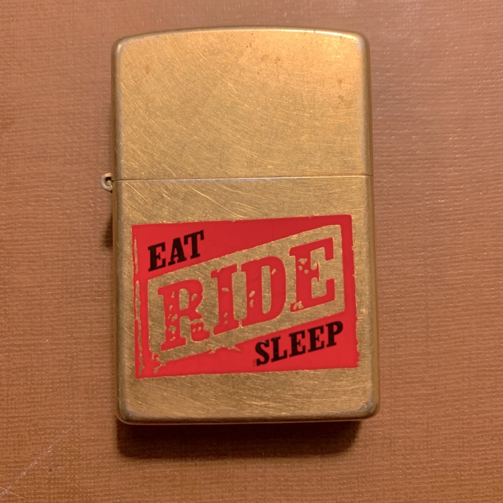Vintage Regular Zippo H04 Eat Ride Sleep Gold Tone